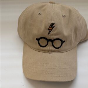 Tan Embroidered Hat with Glasses and Lightning Design